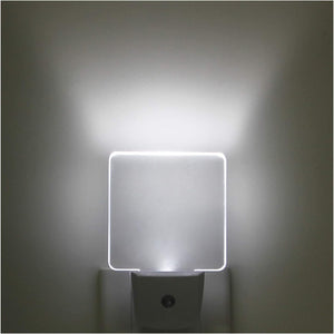Paquete de 2 luces LED de noche con enchufe de 0.5 W con sensor de atardecer a amanecer, luz diurna blanca fría LN23