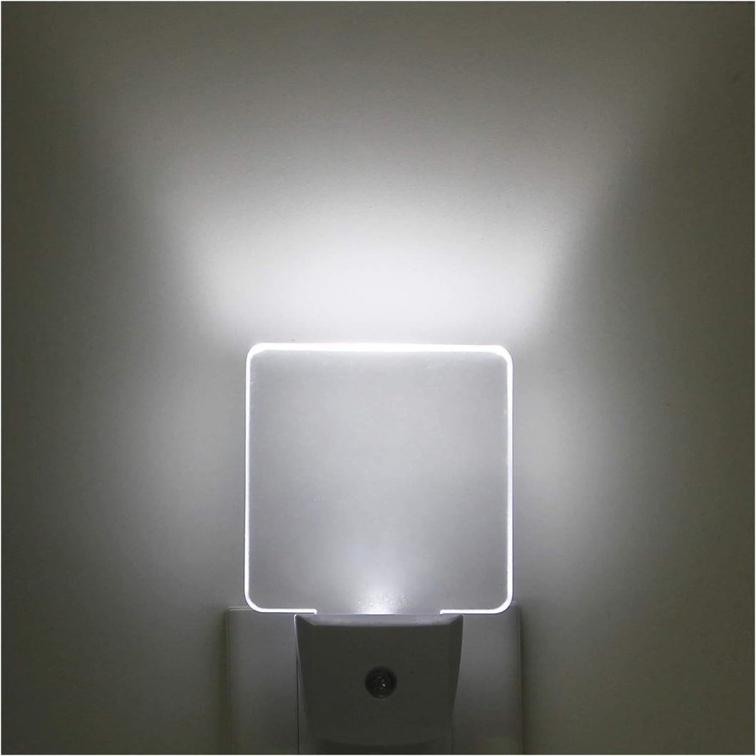 Paquete de 2 luces LED de noche con enchufe de 0.5 W con sensor de atardecer a amanecer, luz diurna blanca fría LN23
