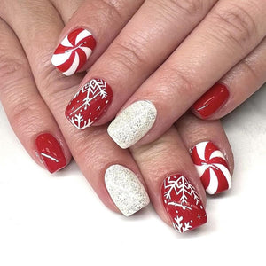 Uñas postizas a presión de Navidad con diseño de rayas plateadas y purpurina