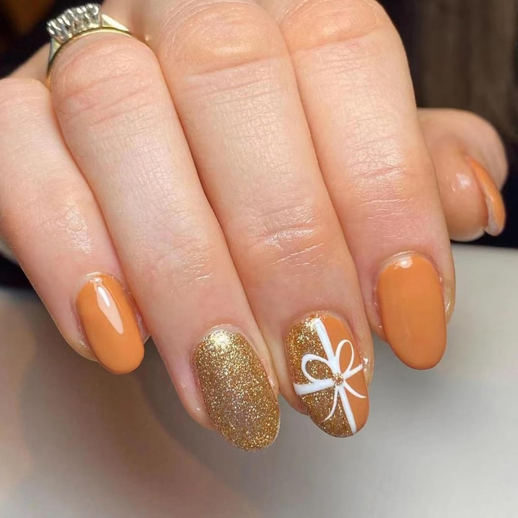 Uñas postizas a presión de Navidad, uñas postizas cortas de almendra, uñas postizas con purpurina dorada con diseño de lazo, uñas acrílicas brillantes A22 , cobertura completa, uñas adhesivas naranjas