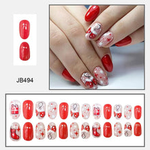 Cargar imagen en el visor de la galería, Uñas postizas a presión de Navidad, uñas postizas medianas con nudo rojo, uñas postizas brillantes con diseño de regalo, uñas adhesivas nude, uñas adhesivas para mujeres, A22  decoración de uñas de Navidad

