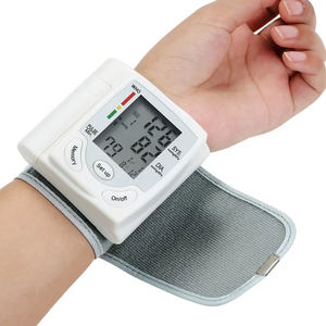 Monitor de presión arterial de muñeca digital ajustable automático