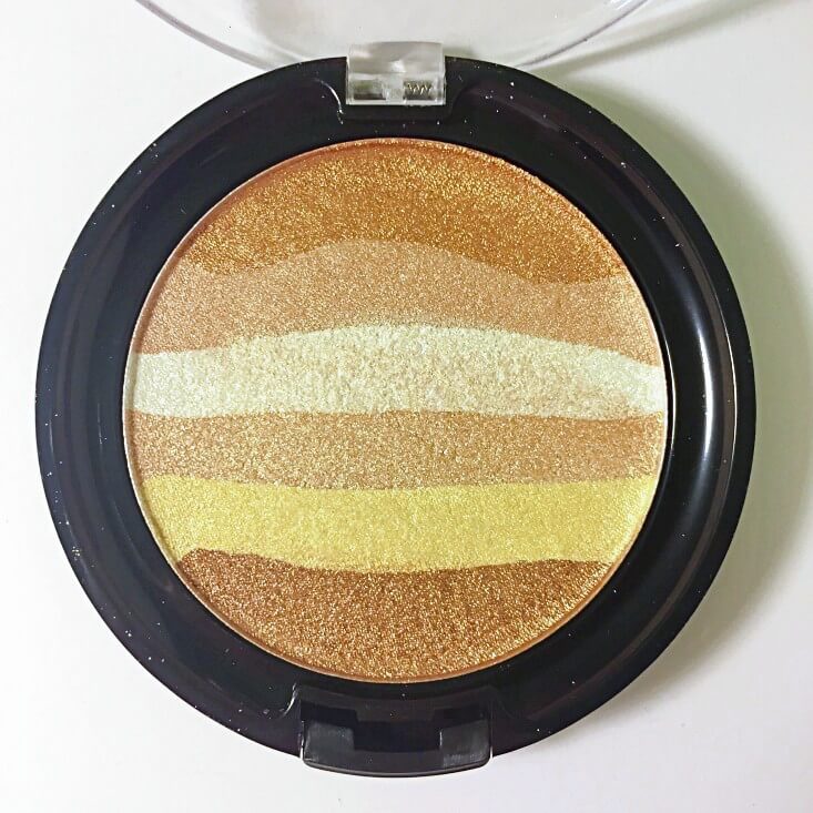 Iluminador Coloricon Rainbow de Wet N Wild Bronce sellado Over The Rainbow